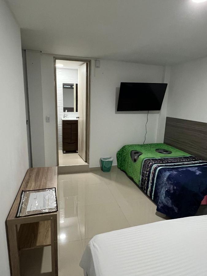 Отель Edificio Niza80 Ibague, Acceso Digital Cerca Parque Deportivo Экстерьер фото