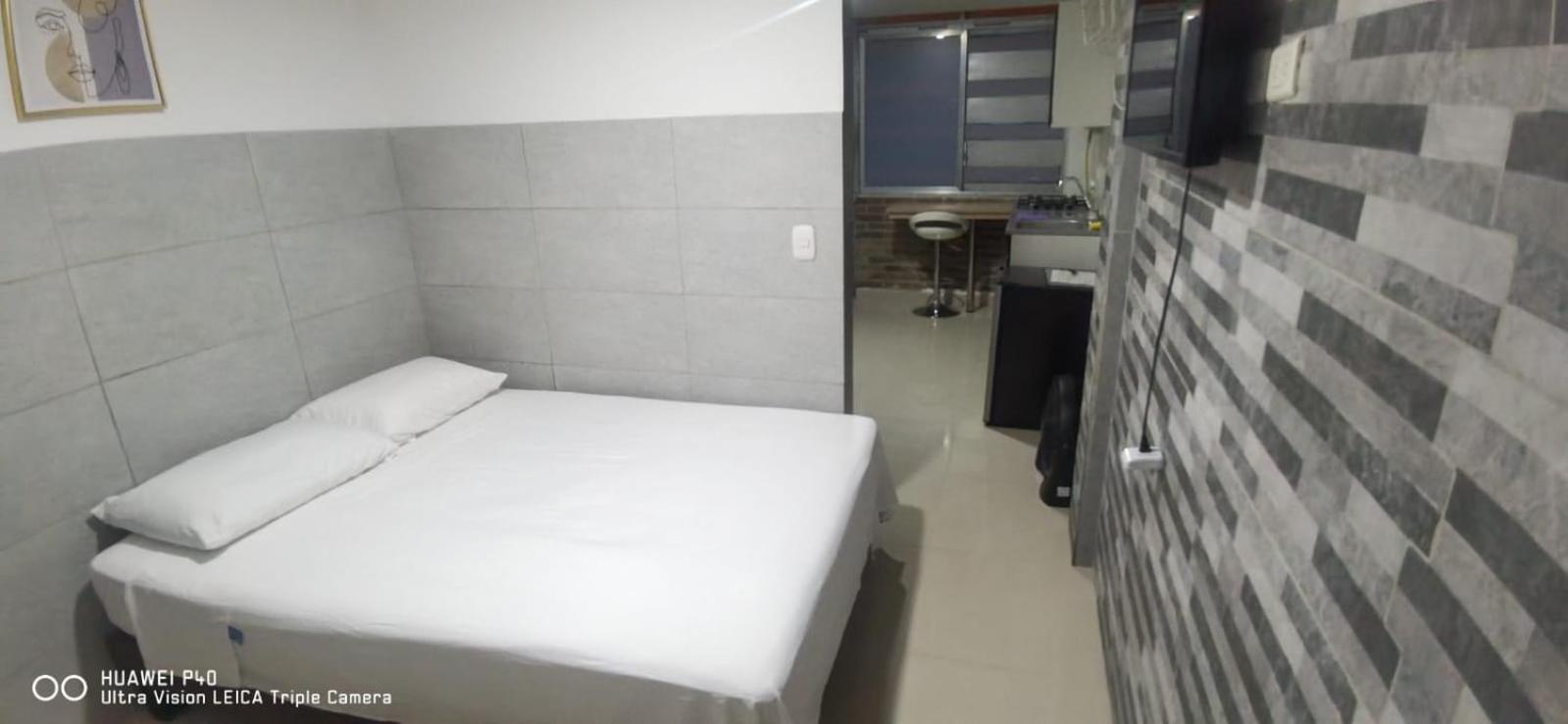 Отель Edificio Niza80 Ibague, Acceso Digital Cerca Parque Deportivo Экстерьер фото